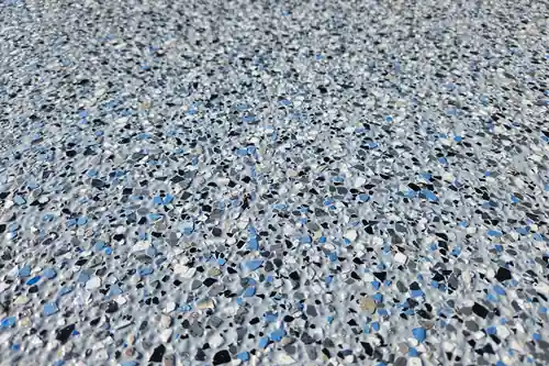 Close-up of a flake epoxy floor with colored chips